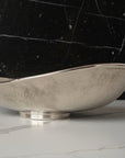 Silver bowl on a white background