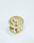 Brass door knobs on a white background