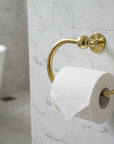 Gold towel ring on a marble surface