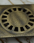 Unlacquered Bronze Floor Drain | Hammered Square Shower Drain