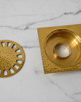 Solid Brass Square Shower Floor Drain – Hammered Design with Removable Cover