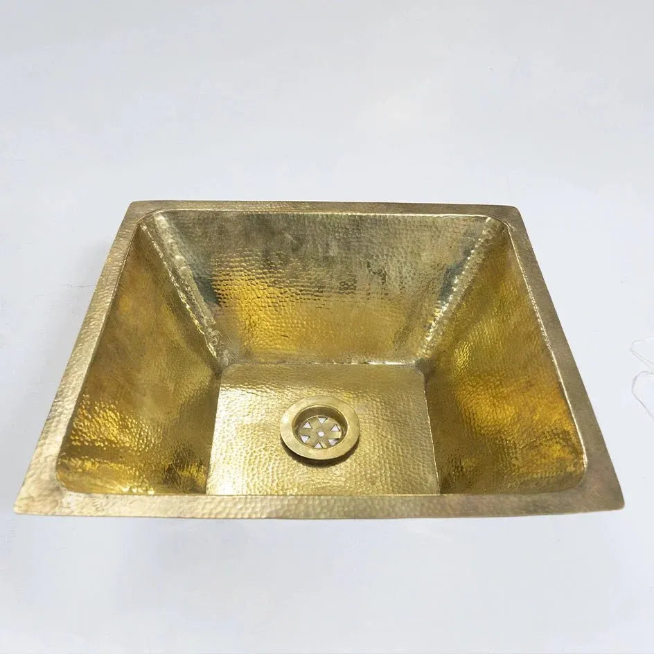 Brass sink on a white background