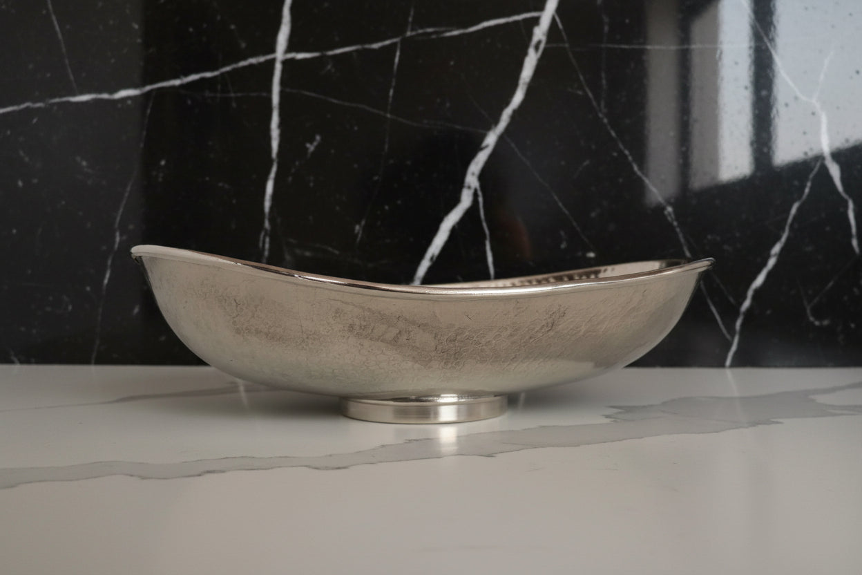 Silver bowl on a white background