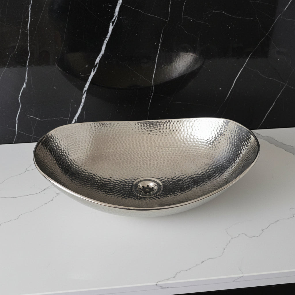 Hammered SILVER sink on a white background