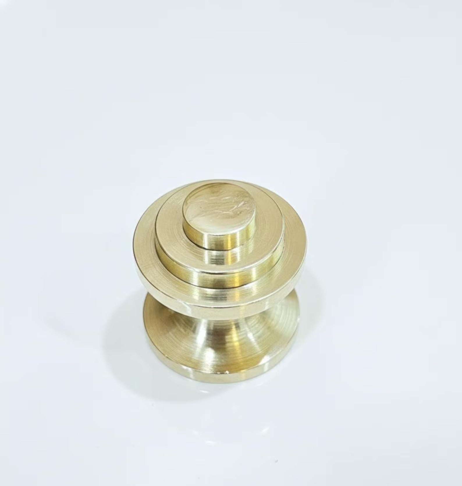 Brass door knobs on a white background