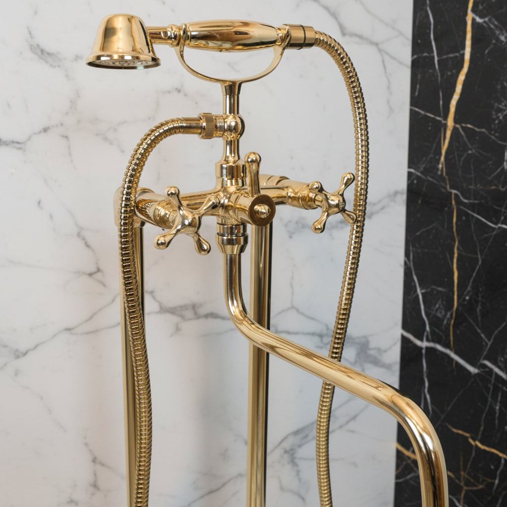 Unlacquered Brass Tub Faucet shower head and hose against a 