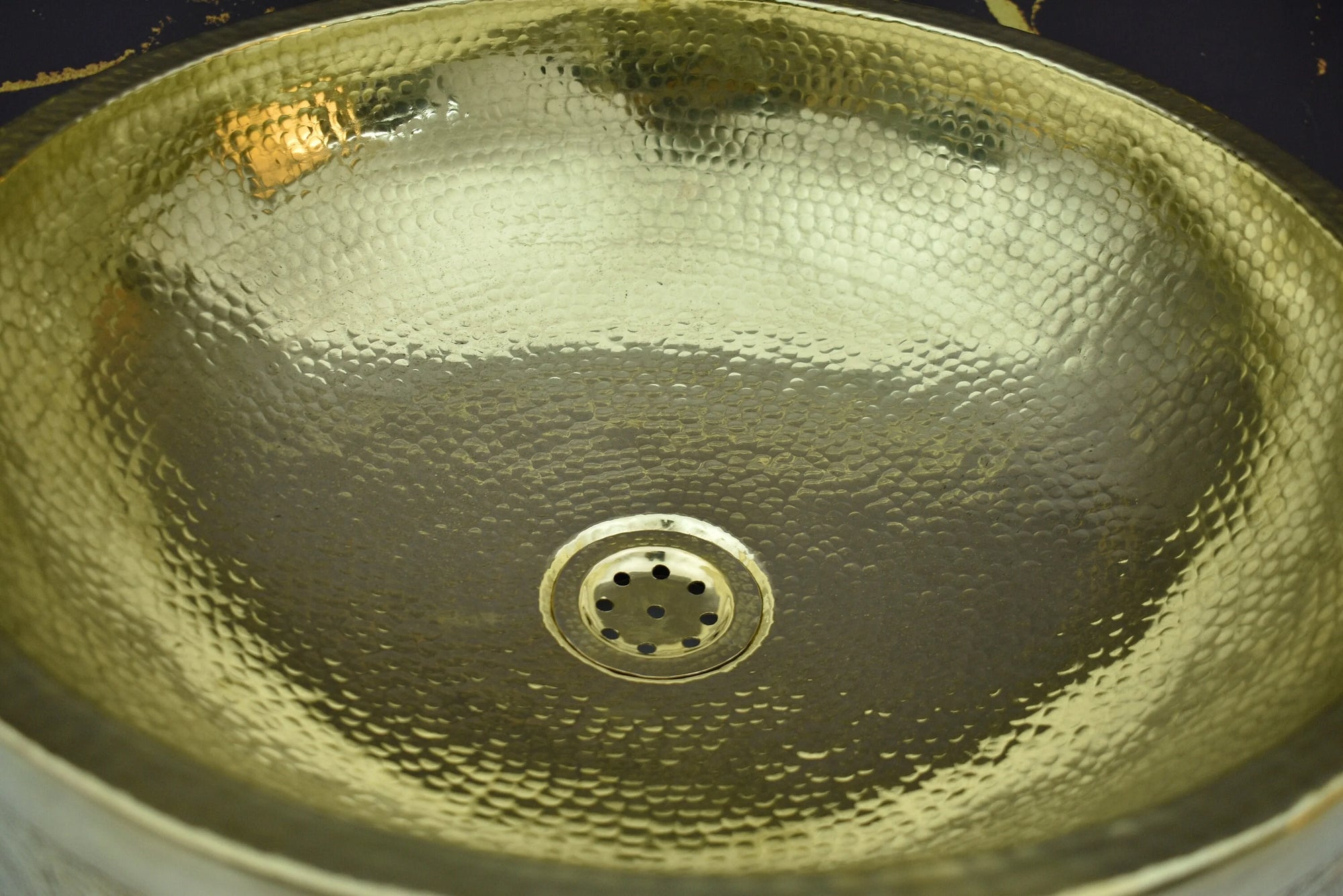 Unlacquered brass bathroom Sink