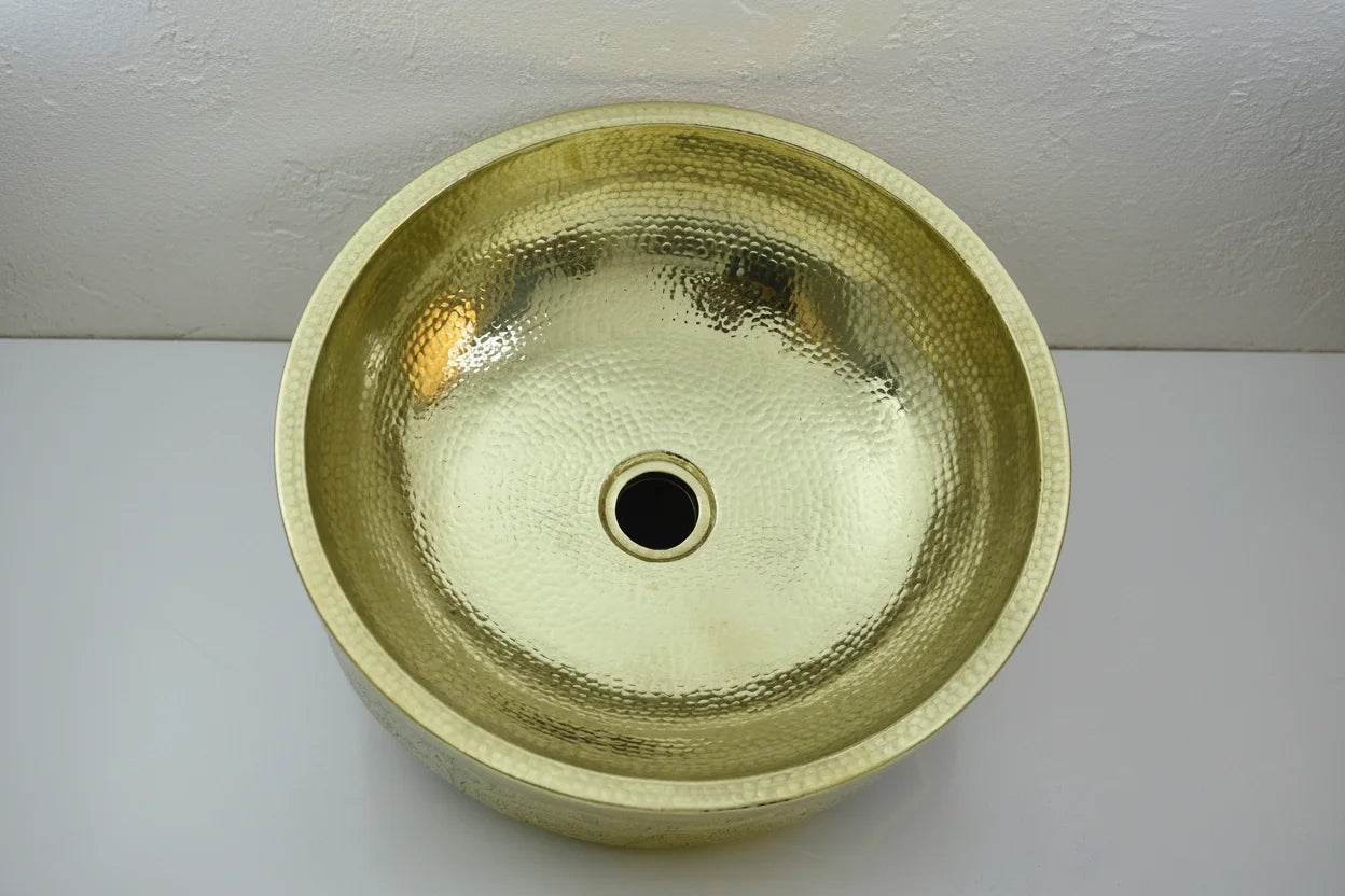 Unlacquered brass bathroom Sink