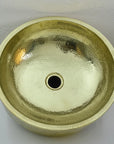 Unlacquered brass bathroom Sink